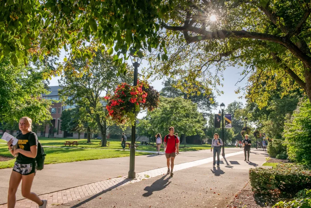 students walking across campus